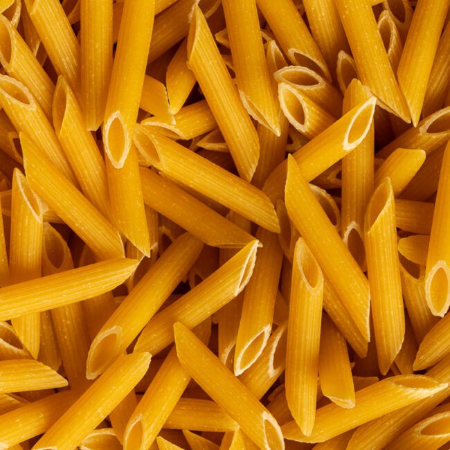 Adrian Crook Cuisine food photography of dried penne pasta